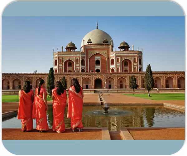 Young Indian ladies and Humayuns Tomb, Delhi, India