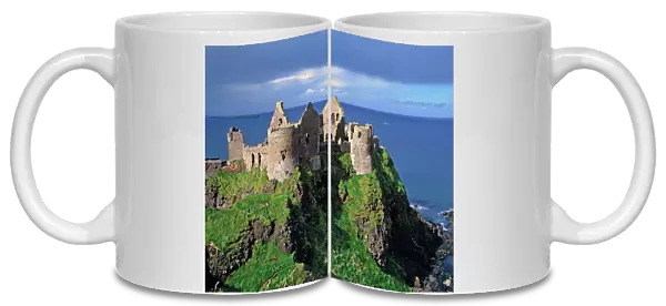 Northern Ireland, County Antrim, Dunluce Castle. Picturesque Dunluce Castle attracts