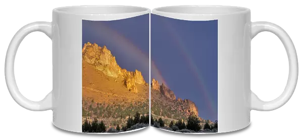 Double rainbow over a rock formation near Smith Rocks State Park. Bend, Central Oregon, USA