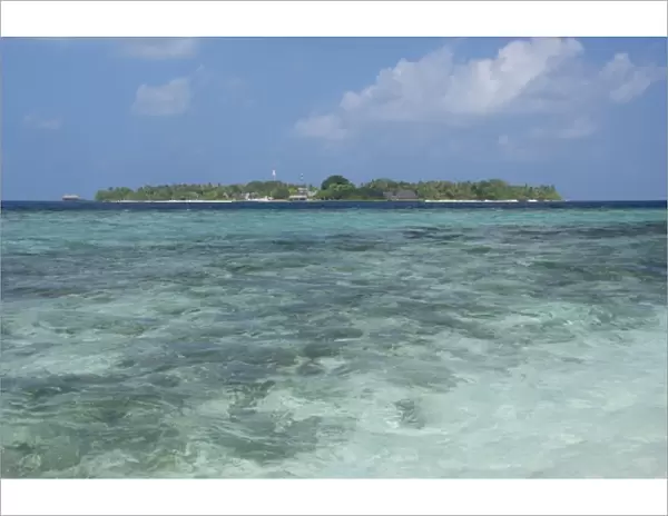 Maldives, North Male Atoll, Island of Kuda Bandos. View of the resort island of Bandos