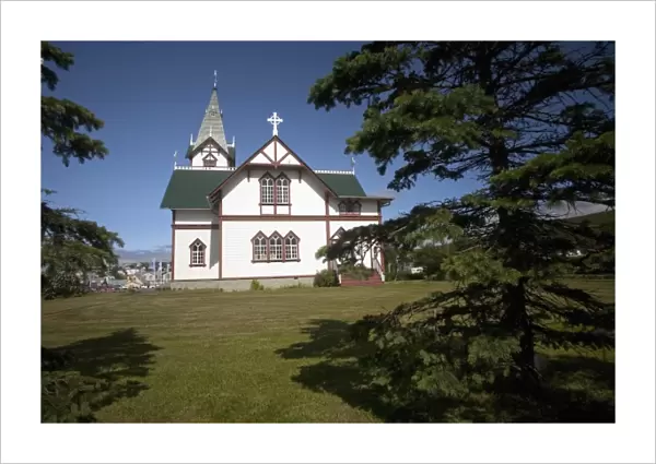 Husavik, Icelands cross-shaped church over looking the harbor is the port citys landmark