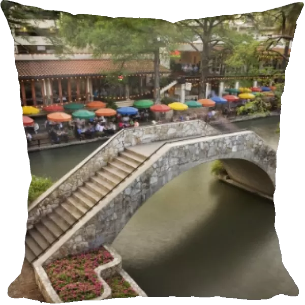 Outdoor cafe along River Walk and bridge over San Antonio River, San Antonio, Texas