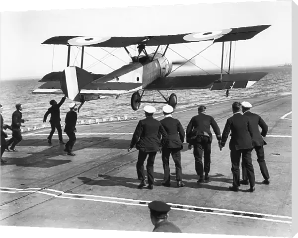 Squadron Commander Edwin Harris Dunning landing his Sopwith Pup biplane on the HMS Furious, the first plane ever to be landed on a moving ship, in Scapa Flow, Orkney, Scotland, 2 August 1917