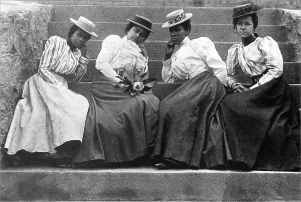 FOUR WOMEN, 19th CENTURY. A late 19th century photograph of four African-American women