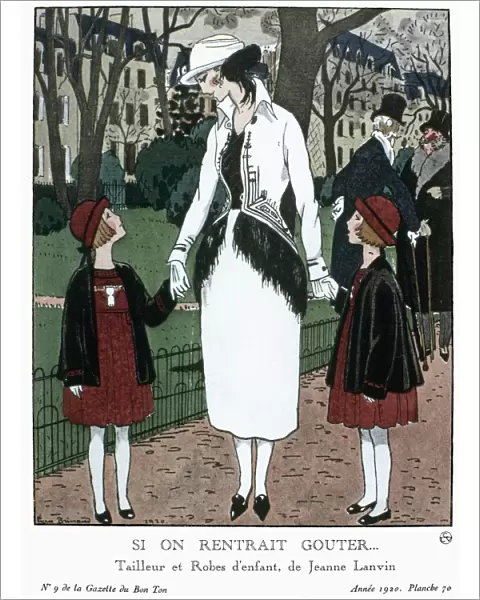 WOMENs FASHION, 1920. A woman and two schoolgirls wearing fashions by Jeanne Lanvin
