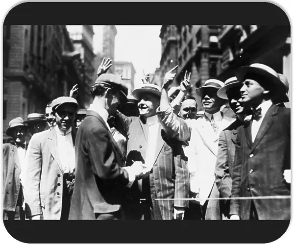 CURB STOCK BROKERS, c1916. Stock brokers trading on the New York Curb Association market