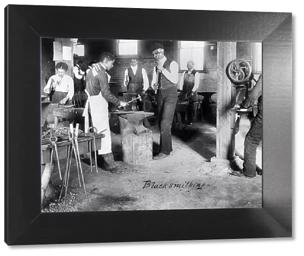 BLACKSMITH CLASS, c1899. African American students learning blacksmithing at the Agricultural