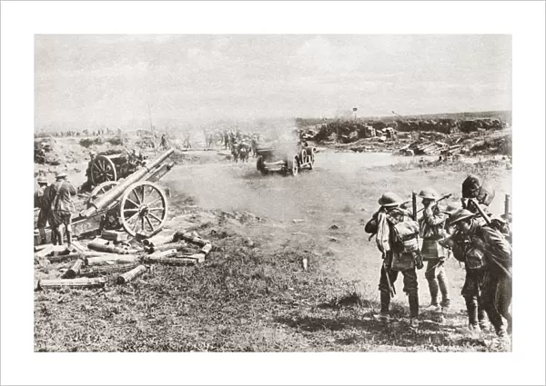 WORLD WAR I: GERMAN GUNS. Large German guns captured by the British are fired back
