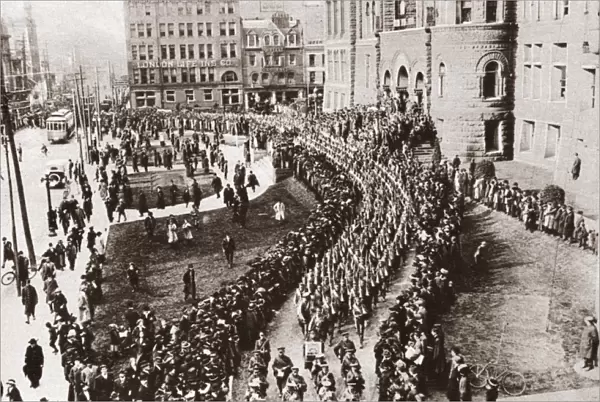 WORLD WAR I: CANADA. The 83rd Battalion of Canadian Infantry passing City Hall in Toronto