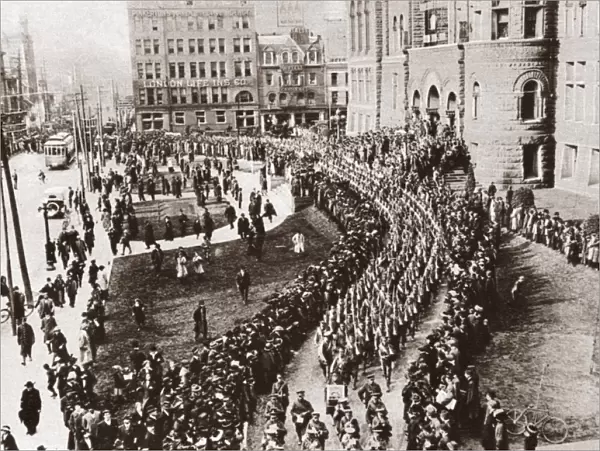 WORLD WAR I: CANADA. The 83rd Battalion of Canadian Infantry passing City Hall in Toronto