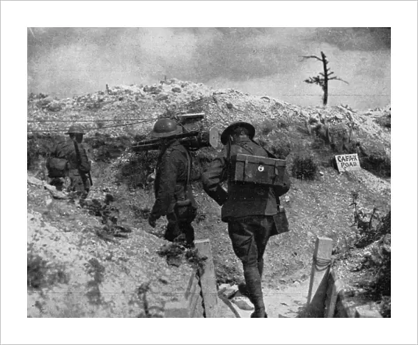 WWI: PHOTOGRAPHERS, 1917. Photographers of the Canadian War Records Office carrying