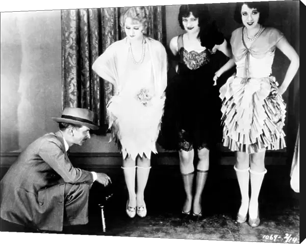 WOMENs FASHION: 1920S. These three flappers of the 20s stylishly expose their