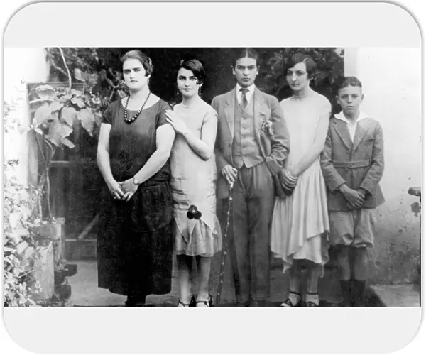 FRIDA KAHLO (1907-1954). Mexican artist. Kahlo dressed in mens clothing (center)