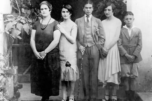 FRIDA KAHLO (1907-1954). Mexican artist. Kahlo dressed in mens clothing (center)