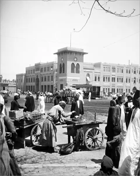 EGYPT: CAIRO. The railroad station in Cairo, Egypt, with vendors in the foreground