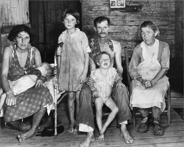 SHARECROPPER FAMILY, 1936. Bud Fields and his family, in Hale County, Alabama