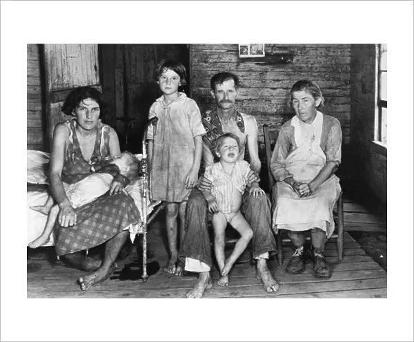 SHARECROPPER FAMILY, 1936. Bud Fields and his family, in Hale County, Alabama