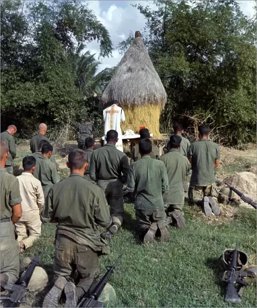 VIETNAM WAR, 1966. Chaplain Bruno Massoti conducting prayer services for troops