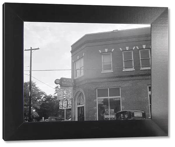 GEORGIA, 1941. A drugstore on the corner in Greene County, Georgia. Photograph by Jack Delano
