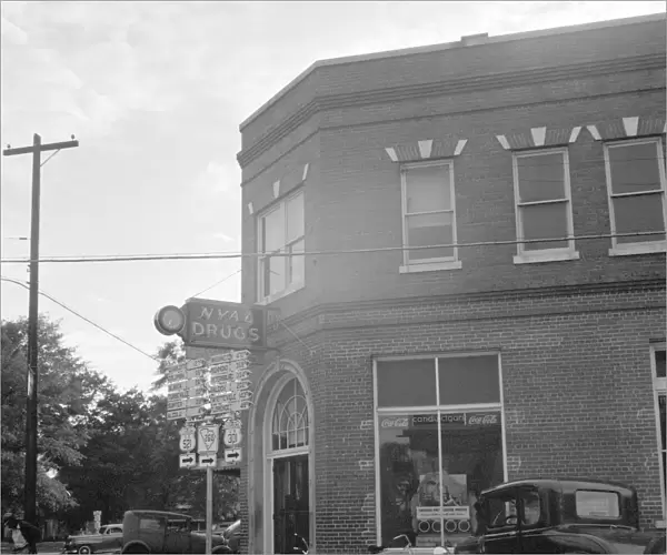 GEORGIA, 1941. A drugstore on the corner in Greene County, Georgia. Photograph by Jack Delano