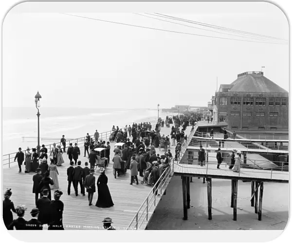 ATLANTIC CITY: BOARDWALK. A view of the boardwalk on Easter morning in Atlantic City, New Jersey. Photograph, c1900