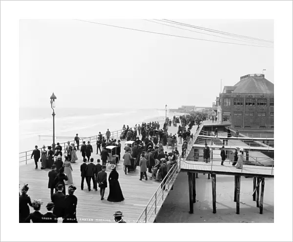 ATLANTIC CITY: BOARDWALK. A view of the boardwalk on Easter morning in Atlantic City, New Jersey. Photograph, c1900