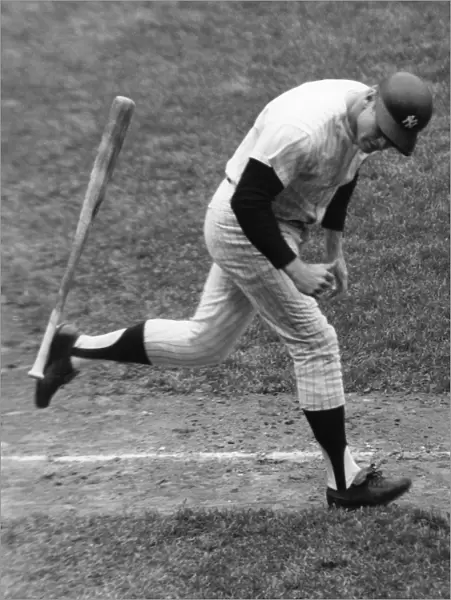 MICKEY MANTLE (1931-1995). American baseball player. As a member of the New York Yankees, tossing his bat aside and beginning his trot around the bases after hitting his 500th career home run off of pitcher Stu Miller of the Baltimore Orioles, at Yankee Stadium in the Bronx, New York City, 14 May 1967