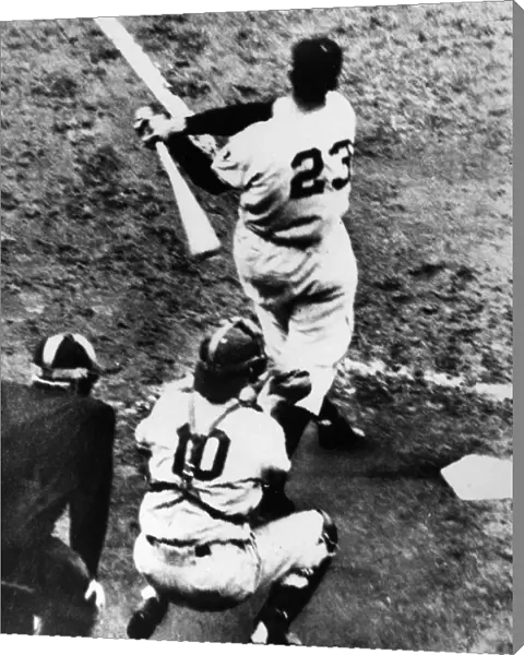 THOMSON HOME RUN, 1951. Bobby Thomson of the New York Giants hitting his pennant-winning home run, the so-called Shot Heard round the World, off of pitcher Ralph Branca of the Brooklyn Dodgers at the Polo Grounds in New York City, 3 October 1951. The Dodgers catcher is Rube Walker and the home plate umpire is Lou Jorda