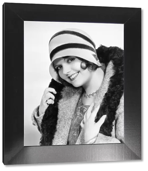 FASHION: CLOCHE HAT, 1929. Sally Starr, American movie actress, photographed in 1929 wearing a cloche
