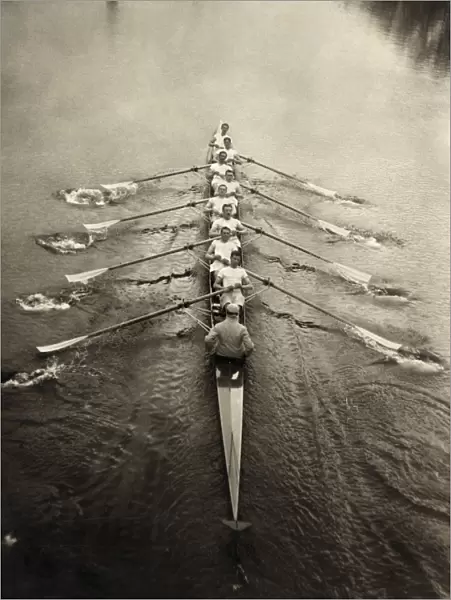 ROWING TEAM, c1913. The Cambridge rowing team on a river. Photograph, c1913