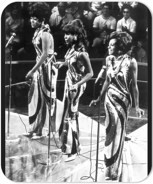 THE SUPREMES, c1963. American vocal trio. From left to right: Florence Ballard, Mary Wilson, and Diana Ross in performance