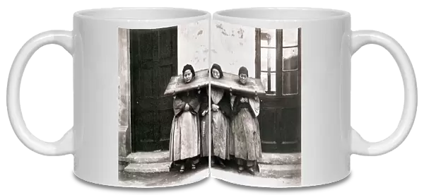 CHINA: PUNISHMENT, 1907. Three women in the cangue, or collar of wood, as punishment, Shanghai, 1907
