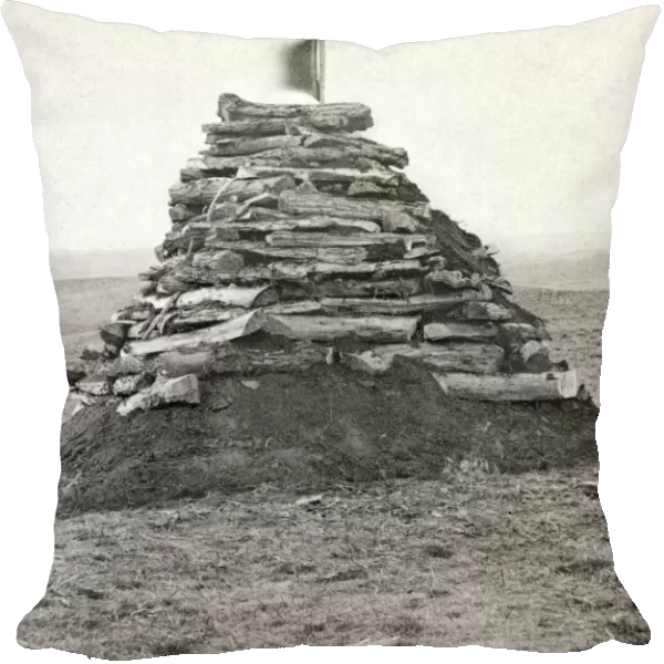 LITTLE BIGHORN MONUMENT. Monument on Custers Hill, containing all the bones found at the site of the Battle of Little Bighorn. Photograph by Stanley Morrow, c1876