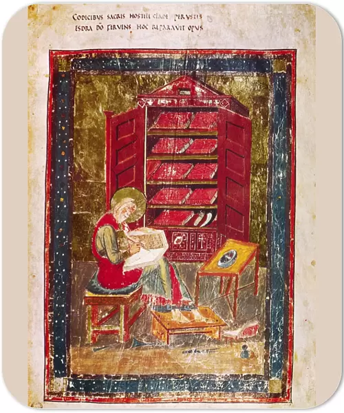 CODEX AMIATINUS: EZRA. Ezra the scribe writing in a large codex held on his knees. Illumination from the Codex Amiatinus, Northumbria, early 8th century