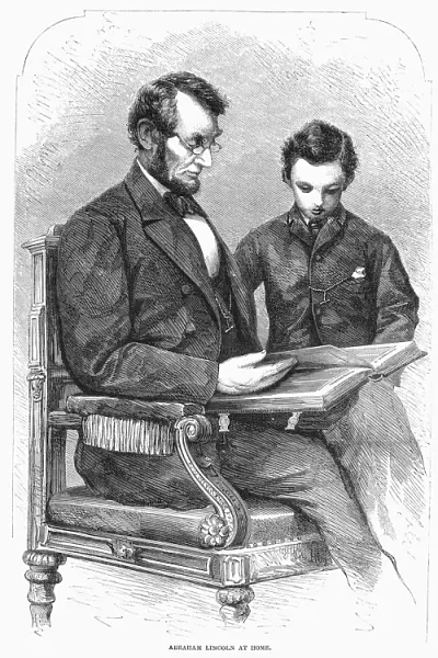 (1809-1865). 16th President of the United States. Lincoln at home with his son Thomas Todd (Tad). Wood engraving, after a photograph of 9 February, 1864