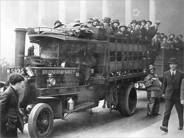 London office workers riding to work on a lorry pressed into bus service during the general strike of May 3-12, 1926