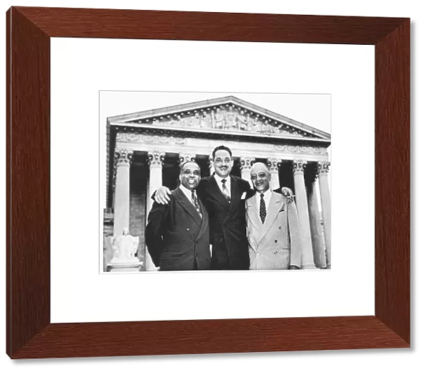 Left to right: NaCP attorneys George E. C. Hayes, Thurgood Marshall and James Nabrit, Jr. celebrate their victory in the Brown vs. the Board of Education case at the Supreme Court in Washington, D. C. 17 May 1954