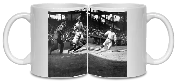 BASEBALL: WASHINGTON, 1925. Bucky Harris of the Washington Nationals sliding into home plate, 1925