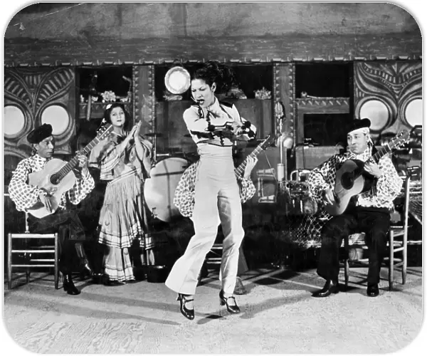 Carmen Amaya (1913-1963) dancing the flamenco. Photograph, 1942