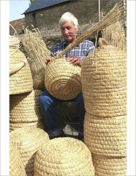 Bee Skep. David Chubb making Bee-Skeps on his farm in the Cotswolds