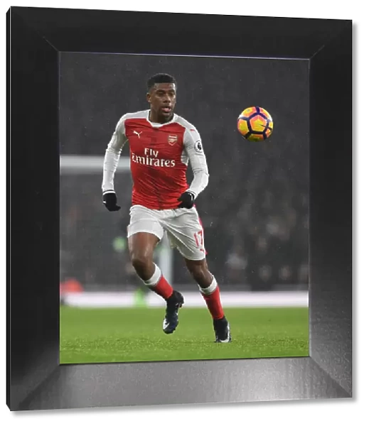 Arsenal's Alex Iwobi in Action during Premier League Clash Against Watford (2016-17)