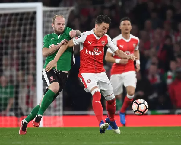 Mesut Ozil Clashes with Bradley Wood in Arsenal's FA Cup Quarter-Final Showdown
