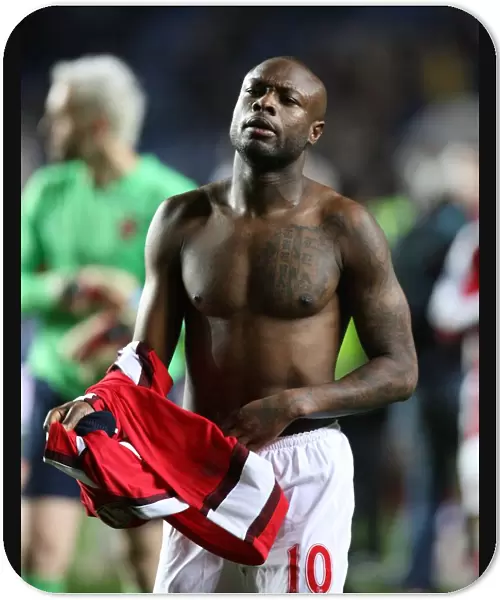 William Gallas throws his shirt to the Arsenal fans after the match