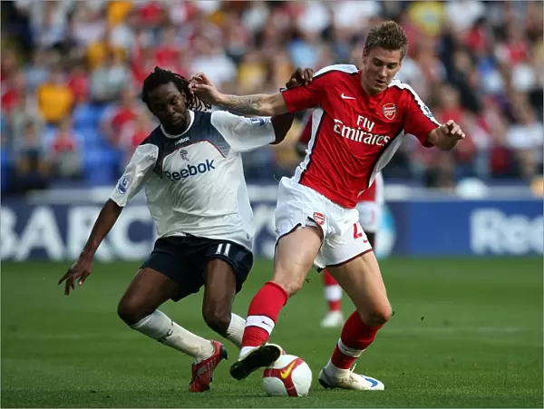 Bolton Wanderers vs. Arsenal: Intense Battle for the Ball - Premier League Soccer (2008-09)
