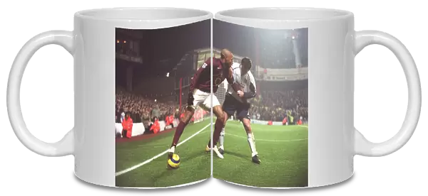 Thierry Henry (Arsenal) Clive Clarke (West Ham). Arsenal 2: 3 West ham United