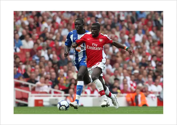 Emmanuel Eboue (Arsenal) Mohamed Diame (Wigan)