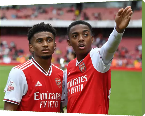 Arsenal's Reiss Nelson and Joe Willock Celebrate Emirates Cup Victory over Olympique Lyonnais