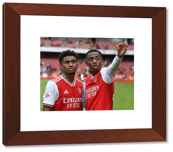 Arsenal's Reiss Nelson and Joe Willock Celebrate Emirates Cup Victory over Olympique Lyonnais