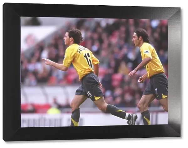 Fabregas and Pires: Unstoppable Duo Celebrates Arsenal's Dominance over Sunderland (2006)