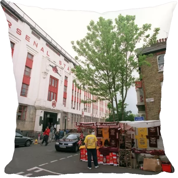 Arsenal Stadium with a house on Conewood Street with Arsenal posters in the windows